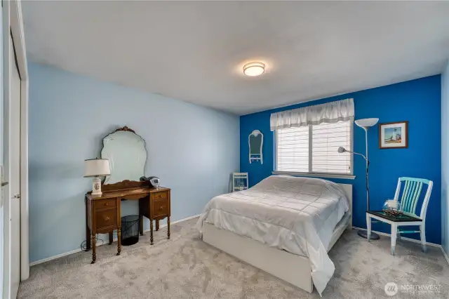 One of four large bedrooms upstairs.