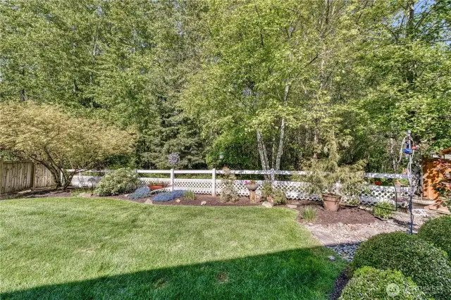 This yard is meticulously maintained and very private.