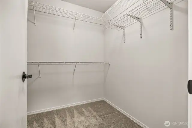 Primary walk-in closet.