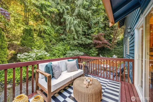 One of the many outdoor entertain areas, conveniently located right outside the kitchen.