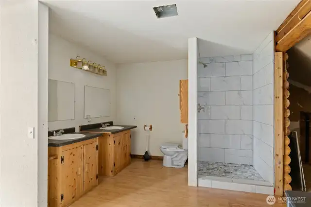 Primary 3/4 bath with elevator access.