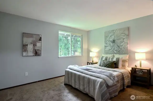 The largest of the 3 bedrooms on the main floor, this has Jack & Jill access to the hall bath.