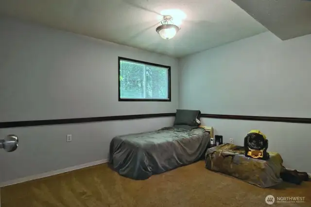 Also on the lower level is an extra room currently used as a bedroom.