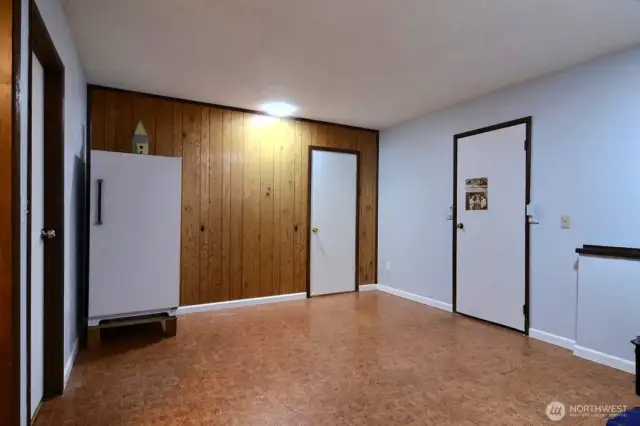 This flex room is perfect for any hobbies or storage needs you may have!  The door on the right opens to the garage.  The door straight ahead is to a storage closet.