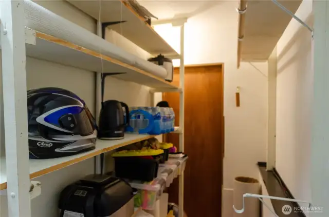 This is the storage closet as seen from that bonus room.  It also connects to the lower level room currently used as a bedroom.