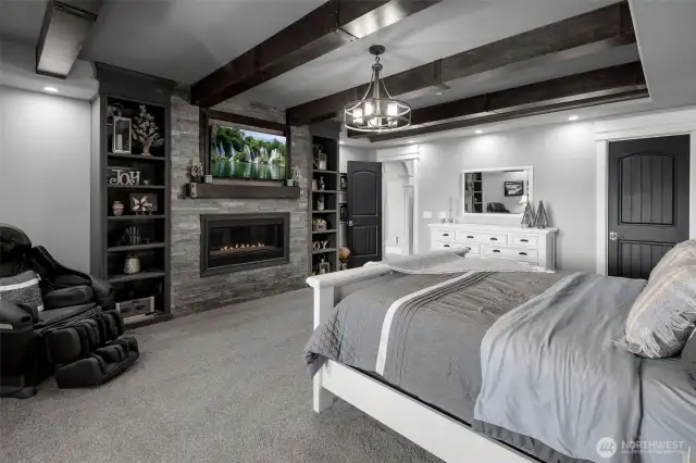 Primary room complete with beautiful fireplace and built ins.