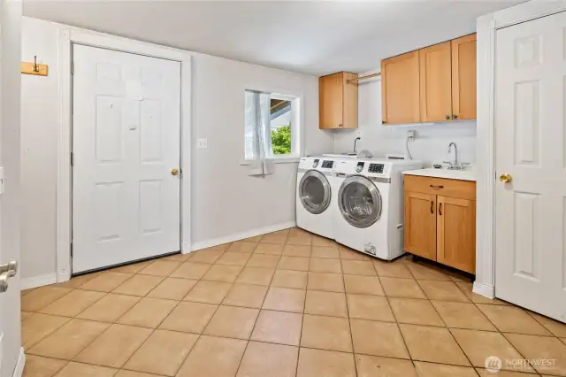 Large laundry/utility room on main floor. Washer and dryer are included.