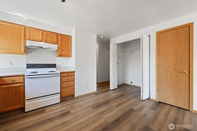 Adjacent to the kitchen is your laundry closet. Door to the right goes to the 1 car garage.