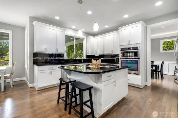 open kitchen with granite counters