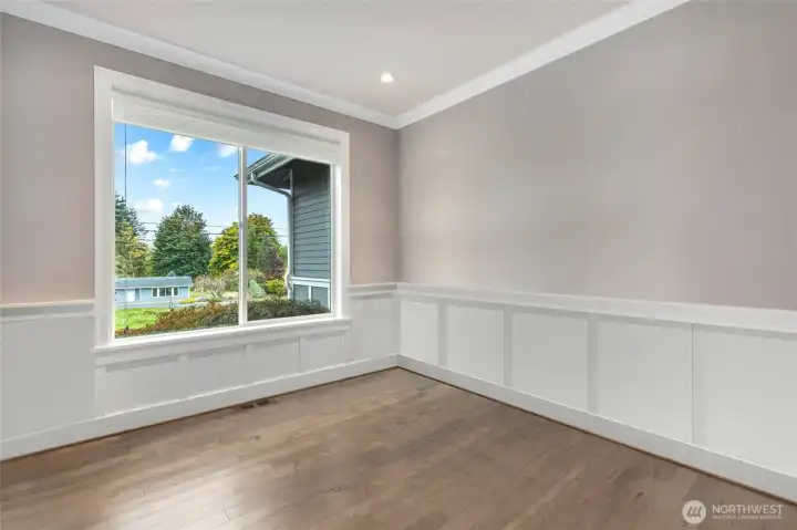 Main floor office with a murphy bed