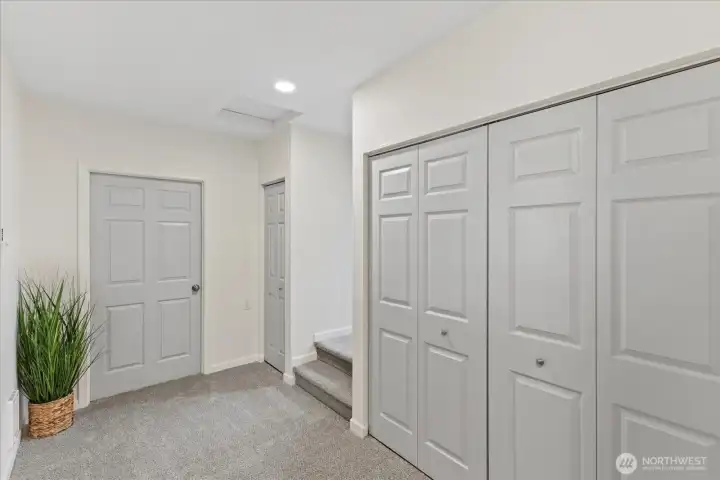 Laundry/flex area leads to storage & 3rd bedroom.