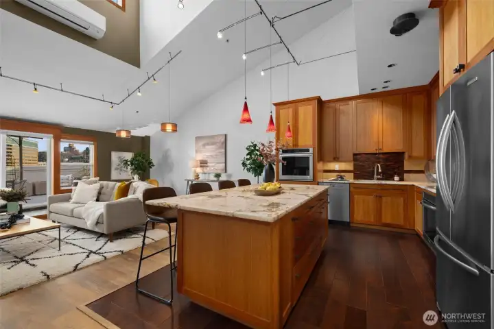 The heart of the home: an expansive kitchen with oversized island, custom cabinetry, and seamless flow to the living spaces.