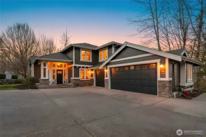 Exterior of home on one acre lot in sought after "Aspen" community. Fee simple land.