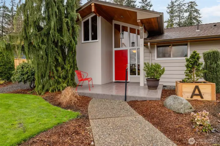 Impressive porch with ample space for decorating. Entry way windows add fantastic curb appeal.