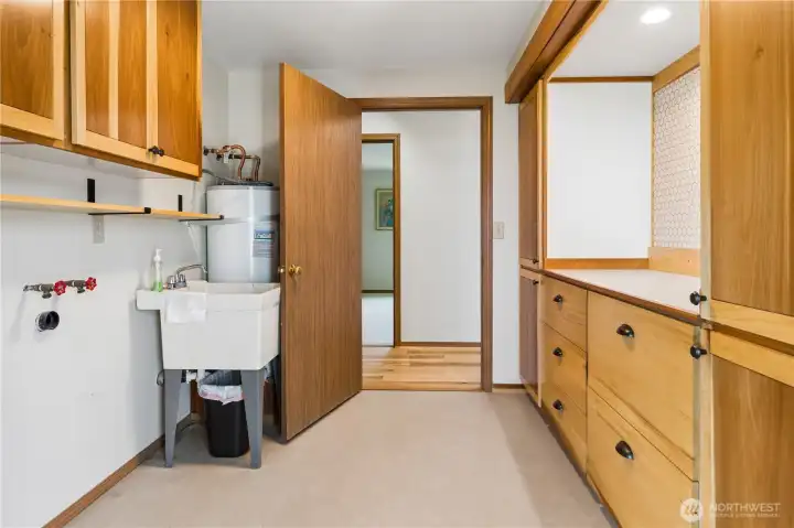 Laundry area with  poplar built in cabinets