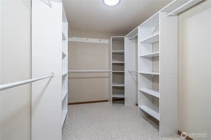Primary closet with new organizers.