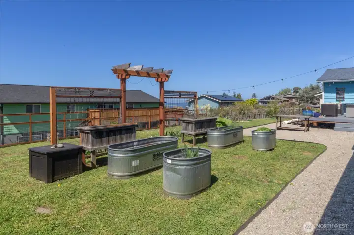 established raised bed and garden area with a view