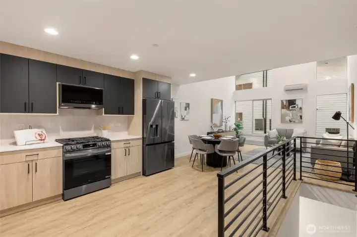 A closer look at the kitchen's sleek quartz countertops and high-end fixtures.