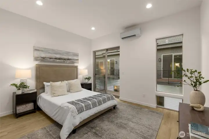 Another angle of the primary suite showcasing the clean lines and tranquil atmosphere.