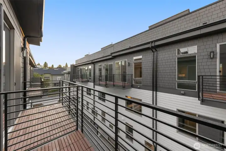 Heading up to the private rooftop deck—your personal urban oasis.