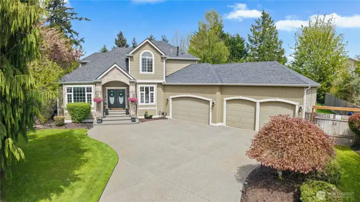 Stunning entry to this elegant home with 4 car garage