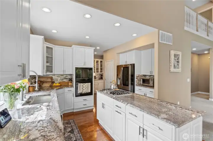 From luxurious granite, to a large island, this kitchen is sure to please