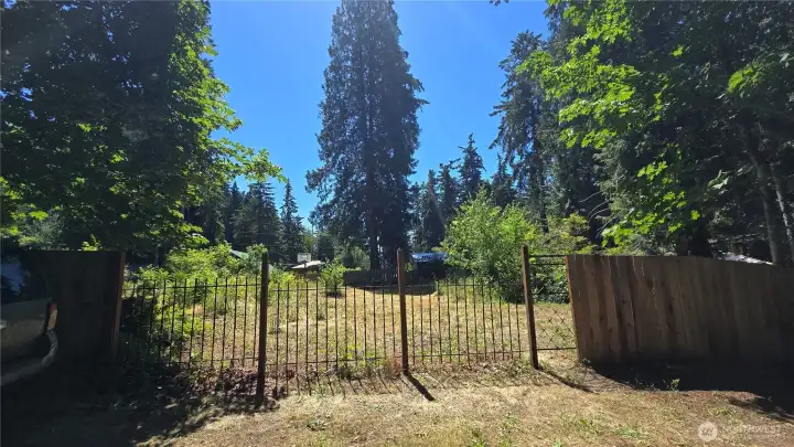 North side of property where you can walk in the gate on the right. North side of property where you can walk in the gate on the right.