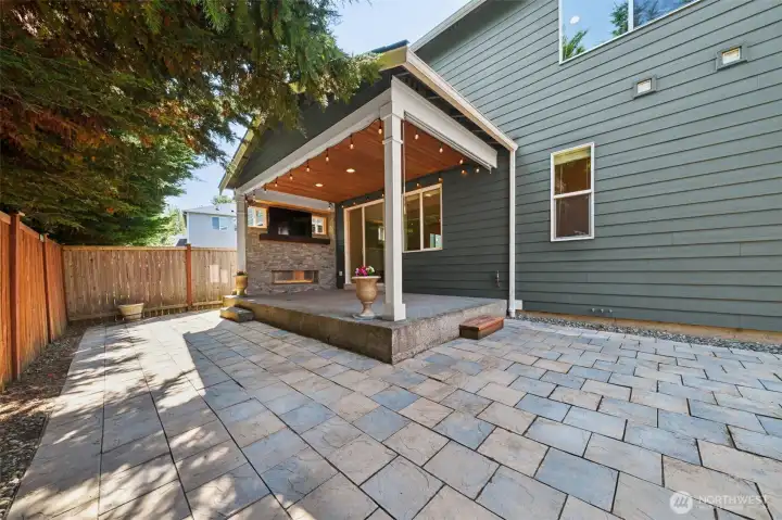 Covered back patio with custom outdoor fireplace Covered back patio with custom outdoor fireplace