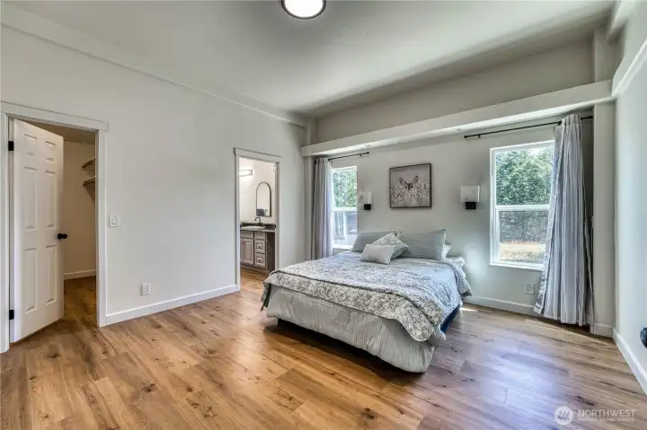 Primary bedroom pictured here with a queen sized bed