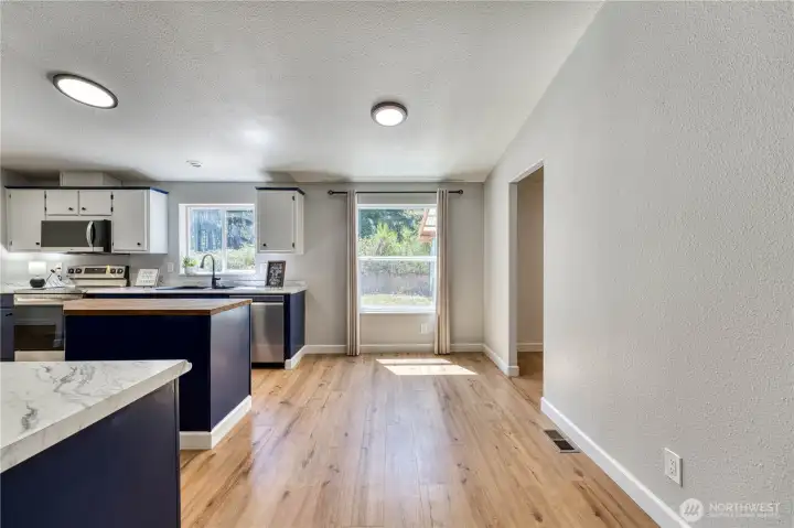 Breakfast nook/informal dining area — laundry area is to the right