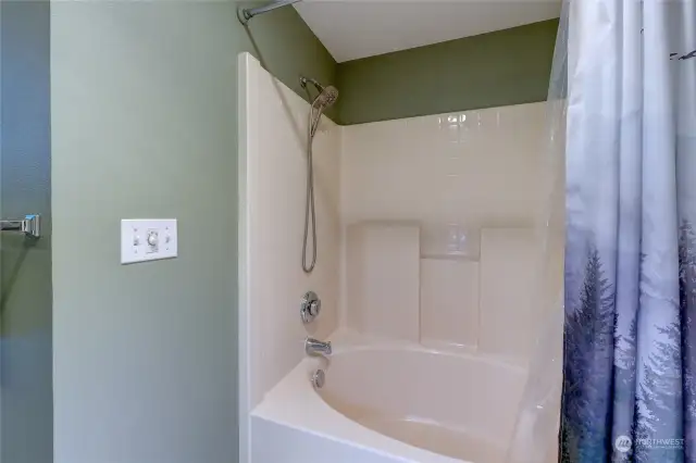Soaking tub and shower combination.