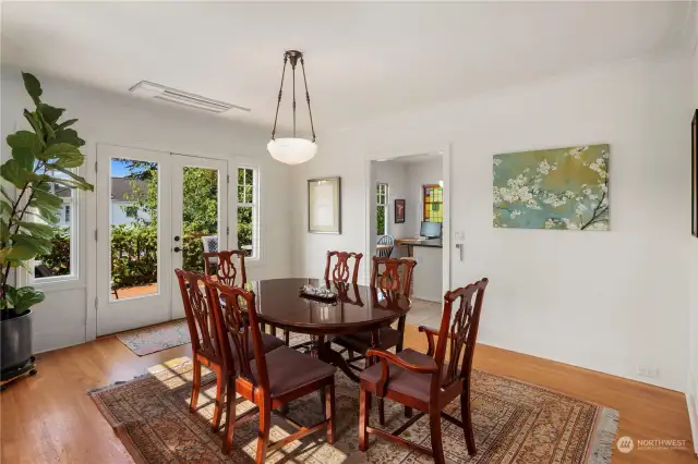 Large formal dining room with Frech doors opening to the west facing deck.  All new HVAC including heat pump and air conditioning -- see ceiling vent by the French doors.  Each unit is individually controlled.