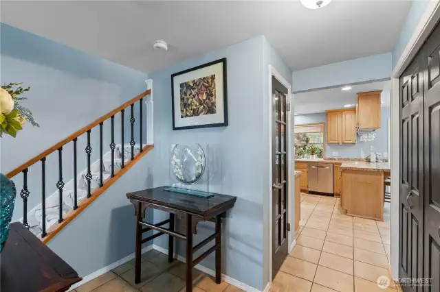 From the entry way, walk into heart of the home with kitchen and family room