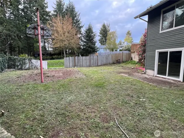Back yard closest to basement sliding door