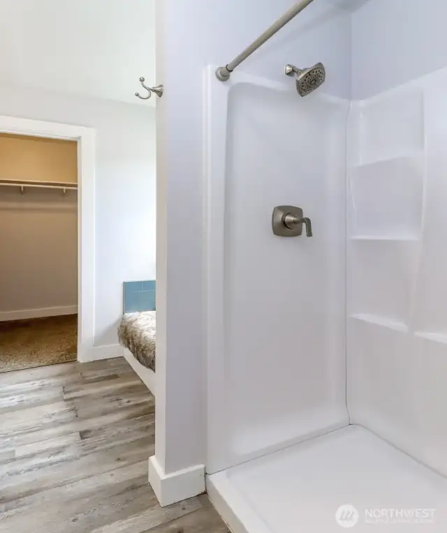 The primary bath has a large step-in shower.