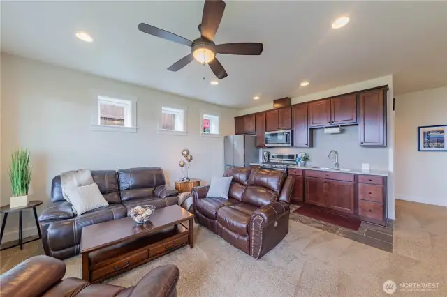 Downstairs living room and kitchen with full size appliances