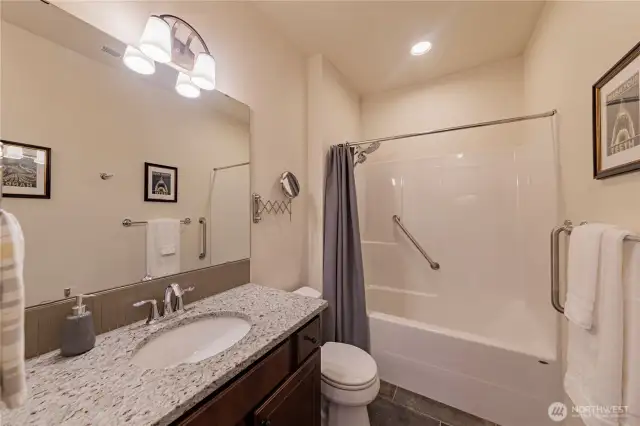 Downstairs spacious full size bathroom with tub