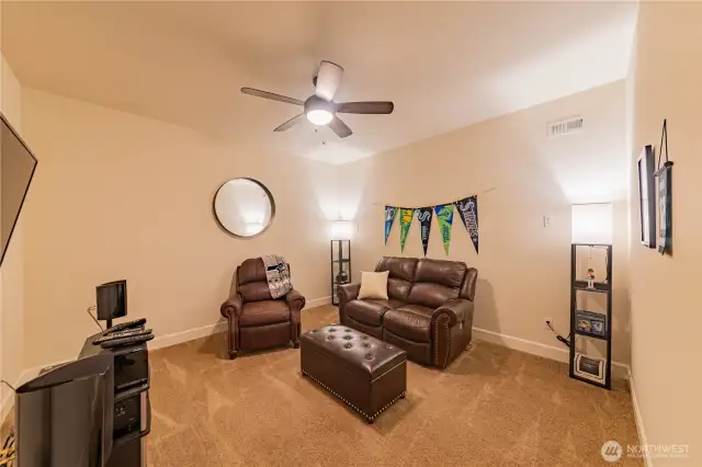 Downstairs flexible space. Wired for a media room. Can be a workout space, den, office... lots of possibilities