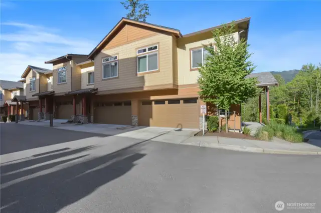 This residence features a spacious two-car garage and offers peaceful mountain living with modern convenience.