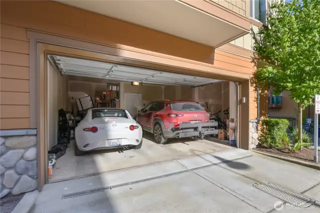 a spacious two-car garage with a 6x6-foot storage room