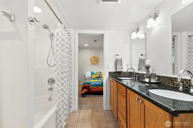 A perfect setup for guests or family—shared bath with privacy doors and thoughtful updates throughout.