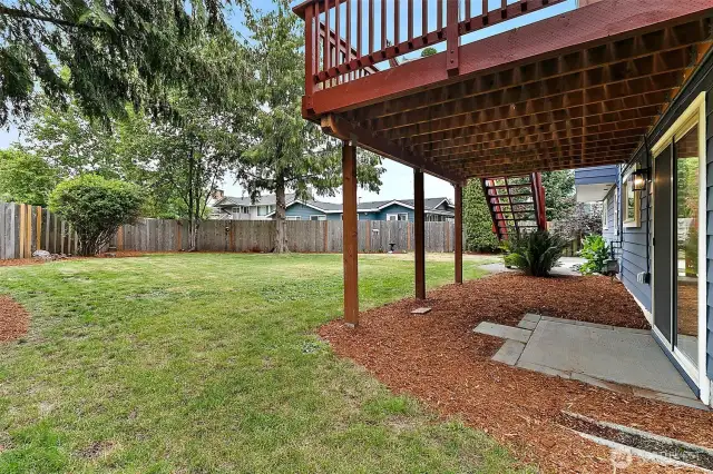 Fully fenced backyard—private, level, and ready for pets, play, or gardening.