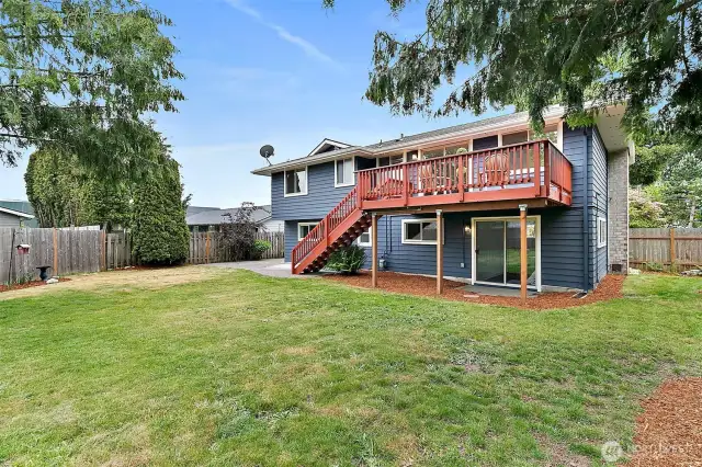 Private and fully fenced, the backyard offers room to relax, garden, play, or unwind under the stars.