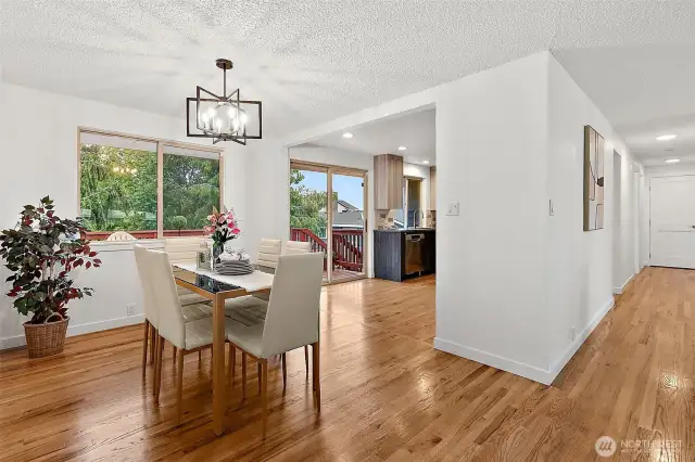 Dining area with easy indoor-outdoor flow—sliding doors lead to the entertainment-sized deck.
