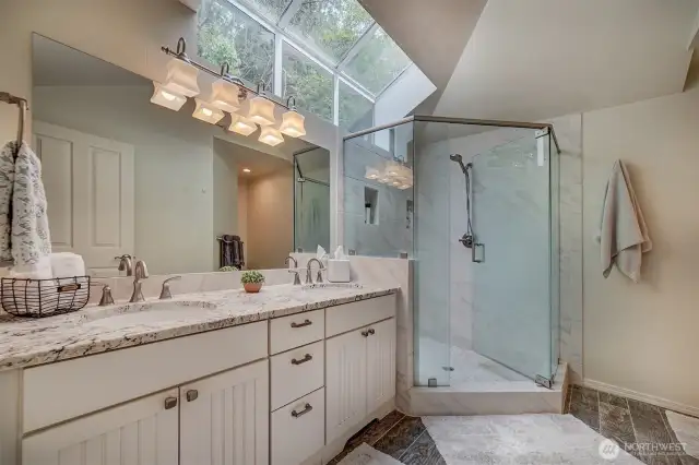 Primary bedroom bathroom with walk-in shower & double sinks