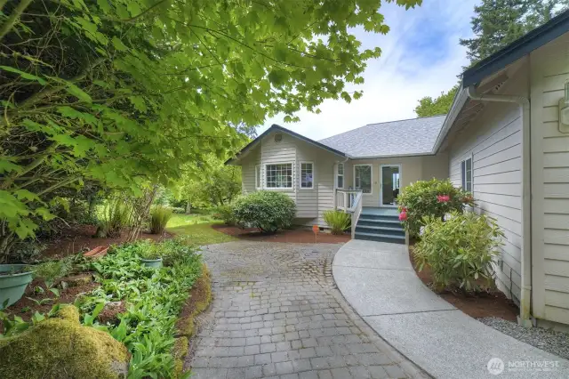 East side of home & main entry