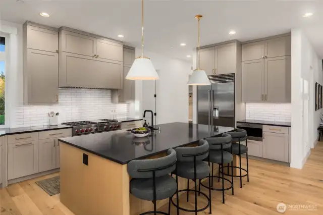 Sleek and convenient Wolf Transitional microwave drawer seamlessly integrated into sophisticated kitchen design. 42" Classic Side by Side Sub Zero Fridge/Freezer with internal water dispenser