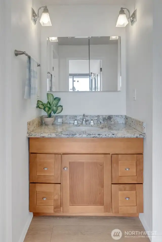 This extra sink is in the hallway for your convenience.