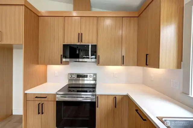Under cabinet lighting and stainless steel appliances