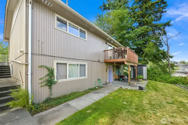 Entrance to lower unit is around back, off of the nicely sized yard.